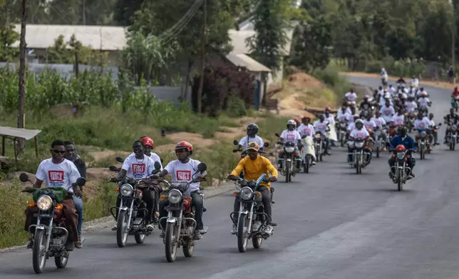 Motorcyclists join an awareness campaign organized by the World Health Organization (WHO) to combat Ebola in Bunia, Congo, Wednesday, June 10, 2026. (AP Photo/Moses Sawasawa)