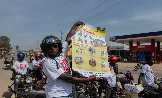 Motorcyclists join an awareness campaign organized by the World Health Organization (WHO) to combat Ebola in Bunia, Congo, Wednesday, June 10, 2026. (AP Photo/Moses Sawasawa)