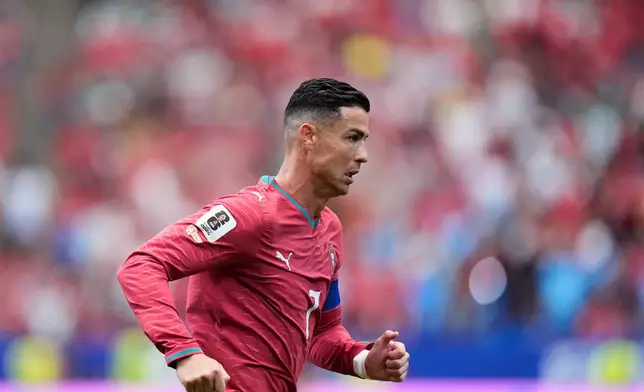 Portugal's Cristiano Ronaldo runs during the World Cup Group K soccer match between Portugal and Congo in Houston, Wednesday, June 17, 2026. (AP Photo/Ashley Landis)