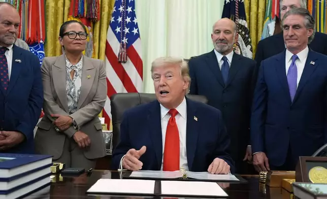 President Donald Trump speaks before signing a proclamation about the fishing industry, in the Oval Office of the White House, Thursday, June 11, 2026, in Washington. (AP Photo/Jacquelyn Martin)