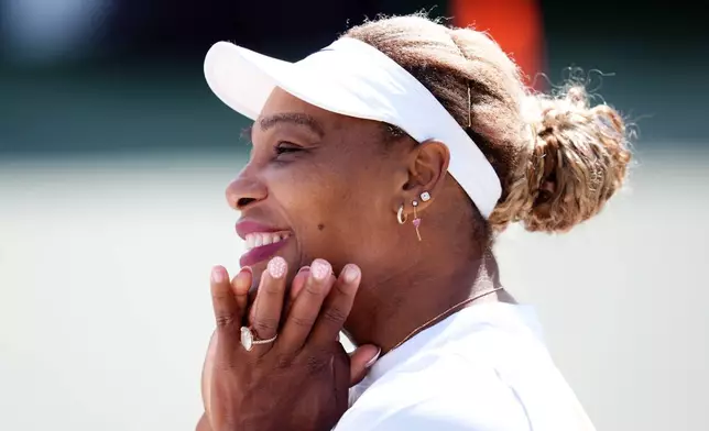Serena Williams of the U.S. reacts during a practice session, ahead of the Wimbledon Tennis Championships, at the All England Lawn Tennis and Croquet Club, in London, Saturday June 27, 2026. (John Walton/PA via AP)
