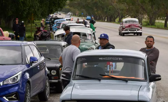FILE - Drivers wait in a long line to enter a gas station in Bacuranao near Havana, Cuba, Jan. 30, 2026. (AP Photo/Ramon Espinosa, File)