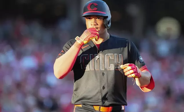 Cincinnati Reds' Noelvi Marte crosses home plate after hitting a solo home run during the second inning of a baseball game against the Arizona Diamondbacks, Friday, June 12, 2026, in Cincinnati. (AP Photo/Kareem Elgazzar)