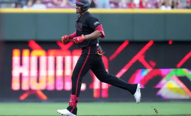 Cincinnati Reds' Noelvi Marte rounds the bases after hitting a solo home run during the first inning of a baseball game against the Arizona Diamondbacks, Friday, June 12, 2026, in Cincinnati. (AP Photo/Kareem Elgazzar)