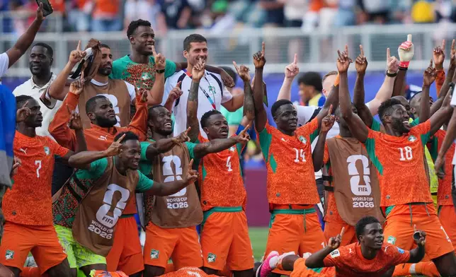 Ivory Coast players celebrate at the end of the World Cup Group E soccer match between Curacao and Ivory Coast in Philadelphia, Thursday, June 25, 2026. (AP Photo/Matt Rourke)