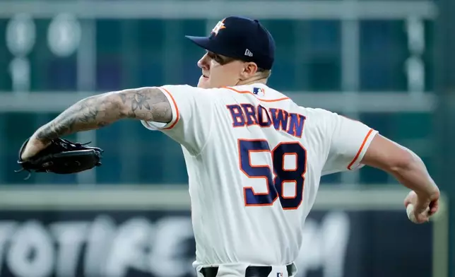 Houston Astros starting pitcher Hunter Brown throws against the Detroit Tigers during the first inning of a baseball game, Tuesday, June 16, 2026, in Houston. (AP Photo/Michael Wyke)
