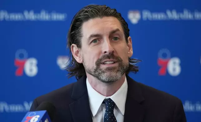Mike Gansey, the Philadelphia 76ers' new president of basketball operations, speaks during a news conference at the NBA basketball team's training facility, Monday, June 8, 2026, in Camden, N.J. (AP Photo/Matt Rourke)