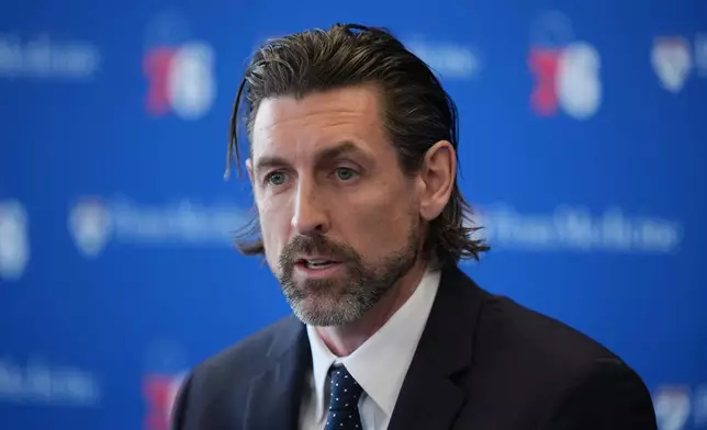 Mike Gansey, the Philadelphia 76ers' new president of basketball operations, speaks during a news conference at the NBA basketball team's training facility, Monday, June 8, 2026, in Camden, N.J. (AP Photo/Matt Rourke)