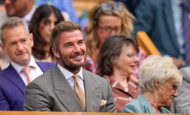 Soccer legend David Beckham sits in the royal box during the men's singles match between Jannik Sinner of Italy and Miomir Kecmanovic of Serbia at the Wimbledon Tennis Championships in London, Monday, June 29, 2026.(AP Photo/Kin Cheung)