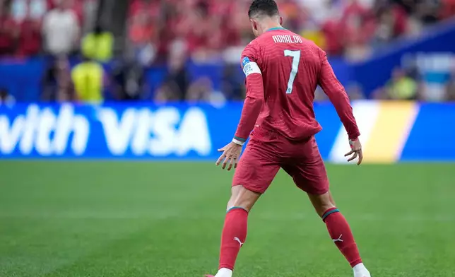 Portugal's Cristiano Ronaldo celebrates after scoring the opening goal during the World Cup Group K soccer match between Portugal and Uzbekistan in Houston, Tuesday, June 23, 2026. (AP Photo/Ashley Landis)