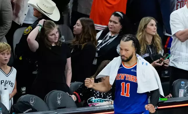 New York Knicks guard Jalen Brunson celebrates after defeating the San Antonio Spurs in Game 5 of the NBA Finals basketball series, Saturday, June 13, 2026, in San Antonio. (AP Photo/Ross D. Franklin)