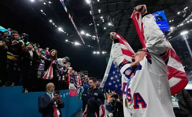 FILE - United States' Jack Eichel celebrates after the United States defeated Canada in a men's ice hockey gold medal game between Canada and the United States at the 2026 Winter Olympics, in Milan, Italy, Feb. 22, 2026. (AP Photo/Petr David Josek, File)