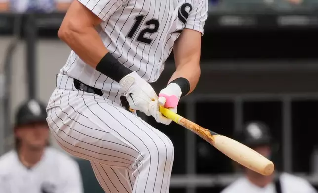 Chicago White Sox's Colson Montgomery watches after hitting a double during the fourth inning of a baseball game against the Los Angeles Dodgers in Chicago, Sunday, June 14, 2026. (AP Photo/Nam Y. Huh)
