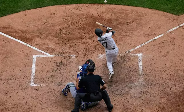 Chicago White Sox's Sam Antonacci hits a solo home run during the sixth inning of a baseball game against the Los Angeles Dodgers in Chicago, Sunday, June 14, 2026. (AP Photo/Nam Y. Huh)