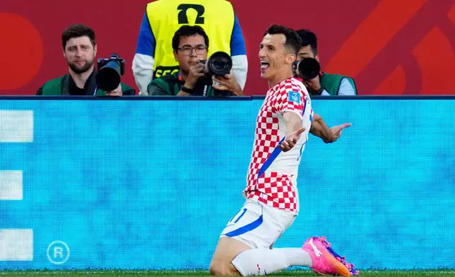 Croatia's Ante Budimir (11) celebrates a goal against Panama during the second half of a World Cup Group L soccer match, in Toronto, on Tuesday, June 23, 2026. (Frank Gunn/The Canadian Press via AP)