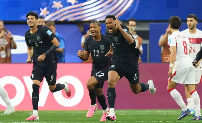 United States' Auston Trusty (6) celebrates scoring his side's first goal against Turkey during the World Cup Group D soccer match in Inglewood, Calif., near Los Angeles, Thursday, June 25, 2026. (AP Photo/Andre Penner)
