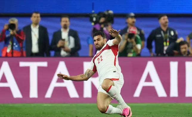 Turkey's Kaan Ayhan celebrates scoring his side's third goal against the United States during the World Cup Group D soccer match in Inglewood, Calif., near Los Angeles, Thursday, June 25, 2026. (AP Photo/Andre Penner)