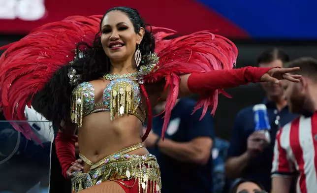 A fan cheers prior to the World Cup Group D soccer match between Turkey and the United States in Inglewood, Calif., near Los Angeles, Thursday, June 25, 2026. (AP Photo/Andre Penner)