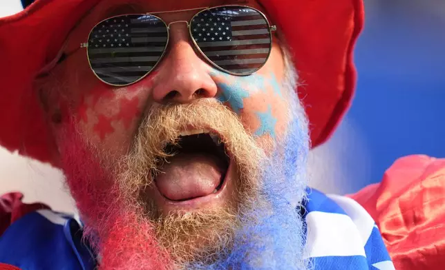 A fan of United States cheers prior to the World Cup Group D soccer match between Turkey and the United States in Inglewood, Calif., near Los Angeles, Thursday, June 25, 2026. (AP Photo/Andre Penner)