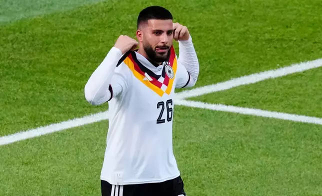 Germany's Deniz Undav (26) celebrates after scoring their second goal during the World Cup Group E soccer match between Germany and Ivory Coast in Toronto, Saturday, June 20, 2026. (Chris Young/The Canadian Press via AP)