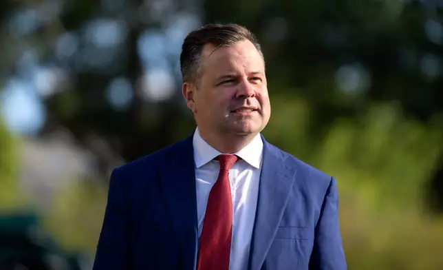 FILE - Director of the Federal Housing Finance Agency Bill Pulte walks outside the White House, Tuesday, Sept. 2, 2025, in Washington. (AP Photo/Mark Schiefelbein, File)