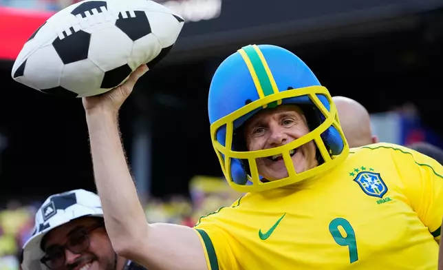A Brazil fan cheers prior to the World Cup Group C soccer match against Morocco in East Rutherford, N.J., near New York, Saturday, June 13, 2026. (AP Photo/Frank Franklin II)