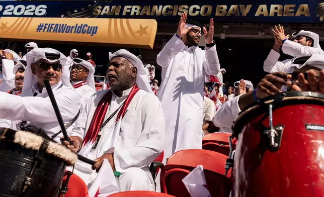 Qatari fans chant before the FIFA World Cup 2026 Group B match between Qatar and Switzerland at San Francisco Bay Area Stadium in Santa Clara, Calif., Saturday, June 13, 2026. (Stephen Lam/San Francisco Chronicle via AP)