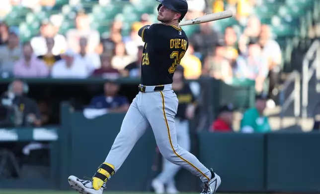 Pittsburgh Pirates' Ryan O'Hearn hits an two RBI double during the first inning of a baseball game against the Athletics, Wednesday, June 17, 2026, in West Sacramento, Calif. (AP Photo/Scott Marshall)
