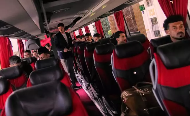 Iran's players get onboard a bus as they leave to Antalya airport, southern Turkey, Saturday, June 6, 2026, before departing to Tijuana, Mexico, for the World Cup soccer tournament. (AP Photo/Khalil Hamra)