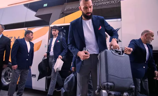Iran's players arrive at Antalya airport, southern Turkey, Saturday, June 6, 2026, before departing to Tijuana, Mexico, for the World Cup soccer tournament. (AP Photo/Khalil Hamra)