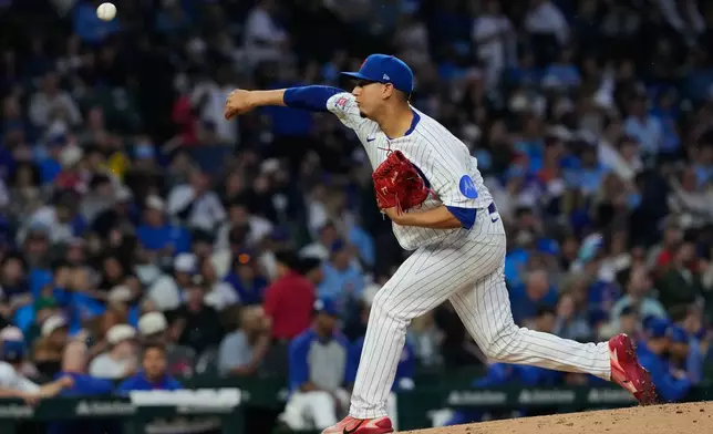 Chicago Cubs starting pitcher Javier Assad throws against the San Francisco Giants during the second inning of a baseball game in Chicago, Sunday, June 7, 2026. (AP Photo/Nam Y. Huh)