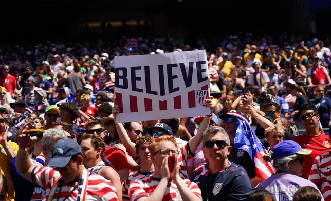 US fans react after the World Cup Group D soccer match between the United States and Australia in Seattle, Friday, June 19, 2026. (AP Photo/Ted S. Warren)