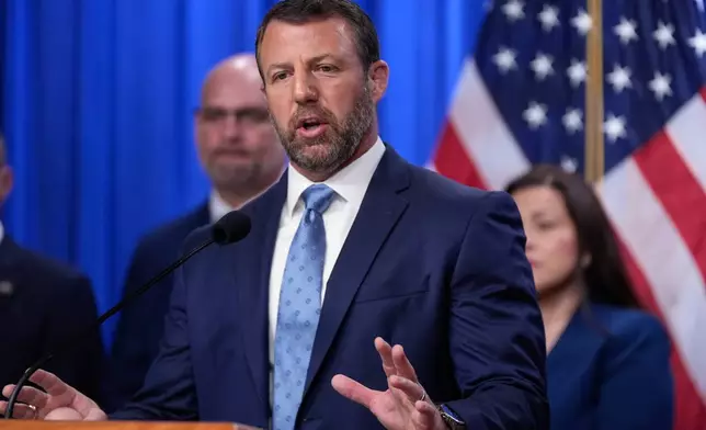 Homeland Security Secretary Markwayne Mullin speaks during a news conference on unaccompanied children at the Justice Department Thursday, June 11, 2026, in Washington. (AP Photo/Manuel Balce Ceneta)