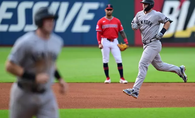 New York Yankees' Paul Goldschmidt, right, runs the bases after hitting a two-run home run off Cleveland Guardians starting pitcher Gavin Williams during the inning of a baseball game, Monday, June 8, 2026, in Cleveland. (AP Photo/David Dermer)