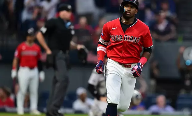 Cleveland Guardians' Angel Martinez runs the bases after hitting a two-run home run off New York Yankees relief pitcher Brent Headrick during the sixth inning of a baseball game, Monday, June 8, 2026, in Cleveland. (AP Photo/David Dermer)