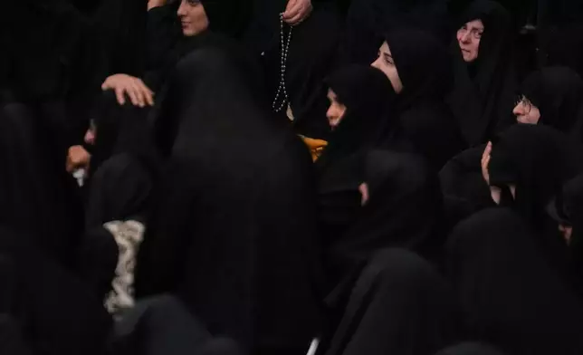 Iranians attend a mourning ceremony in Tehran, Iran, Thursday, June 25, 2026, in the holy day of Ashoura which commemorates the martyrdom of Imam Hussein, a grandson of the Prophet Muhammad, one of Shiite Islam's most beloved saints, and his family and companions at the Battle of Karbala in A.D. 680, in present-day Iraq, after refusing to pledge allegiance to the Umayyad caliphate. (AP Photo/Vahid Salemi)
