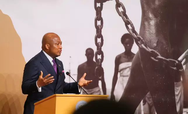 Ghana's Foreign Minister, Samuel Okudzeto Ablakwa, addresses delegates at the opening of the Slavery Reparations Conference in Accra, Ghana, Wednesday, June 17, 2026. (AP Photo/Reuben Ekow Quansah)
