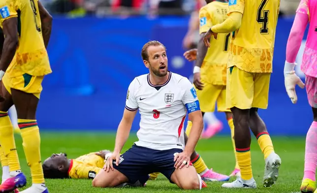 England's Harry Kane (9) reacts after missing a shot on goal during the World Cup Group L soccer match between England and Ghana in Foxborough, Mass., near Boston, Tuesday, June 23, 2026. (AP Photo/Petr David Josek)