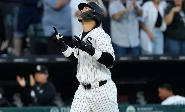 Chicago White Sox's Miguel Vargas celebrates as he rounds the bases after hitting a solo home run during the sixth inning of a baseball game against the Cleveland Guardians in Chicago, Tuesday, June 23, 2026. (AP Photo/Nam Y. Huh)