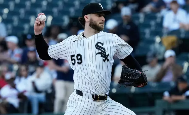 Chicago White Sox starting pitcher Sean Burke throws against the Cleveland Guardians during the first inning of a baseball game in Chicago, Tuesday, June 23, 2026. (AP Photo/Nam Y. Huh)