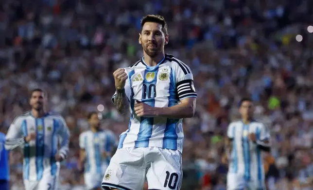 Argentina forward Lionel Messi (10) reacts after scoring on a free kick during the second half of an international friendly match against Iceland, Tuesday, June 9, 2026, in Auburn, Ala. (AP Photo/Butch Dill)
