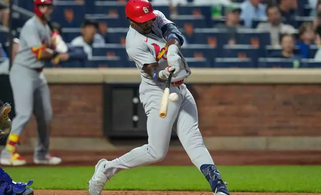 St. Louis Cardinals designated hitter Jordan Walker hits a three-run home run during the fourth inning of a baseball game against the New York Mets, Wednesday, June 10, 2026, in New York. (AP Photo/Yuki Iwamura)