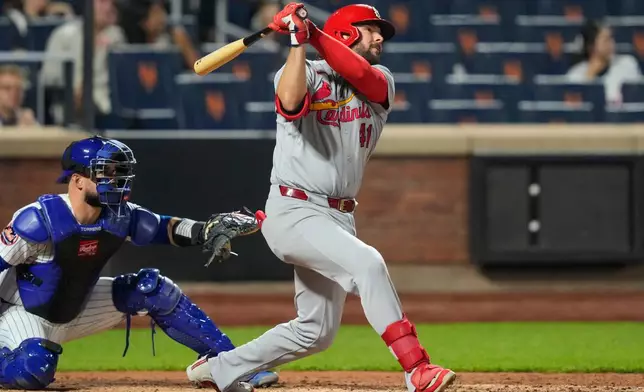St. Louis Cardinals' Alec Burleson hits a home run during the ninth inning of a baseball game against the New York Mets, Wednesday, June 10, 2026, in New York. (AP Photo/Yuki Iwamura)