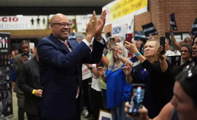 Gubernatorial candidate Aaron Ford, attorney general of Nevada, celebrates with attendees during a primary election night watch party after winning the Democratic nomination Tuesday, June 9, 2026, in Las Vegas. (AP Photo/Jae C. Hong)