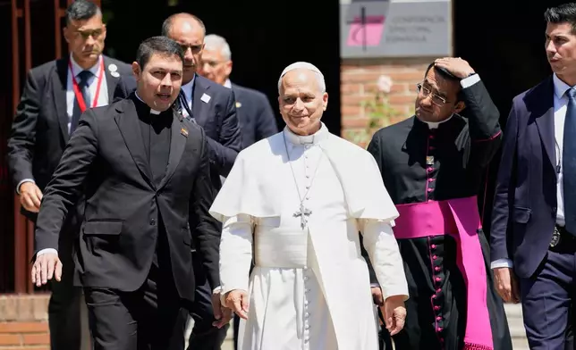 Pope Leo XIV leaves after meeting with Spain's bishops at the Spanish Episcopal Conference in Madrid, Spain, Monday, June 8, 2026. (AP Photo/Andrea Comas)