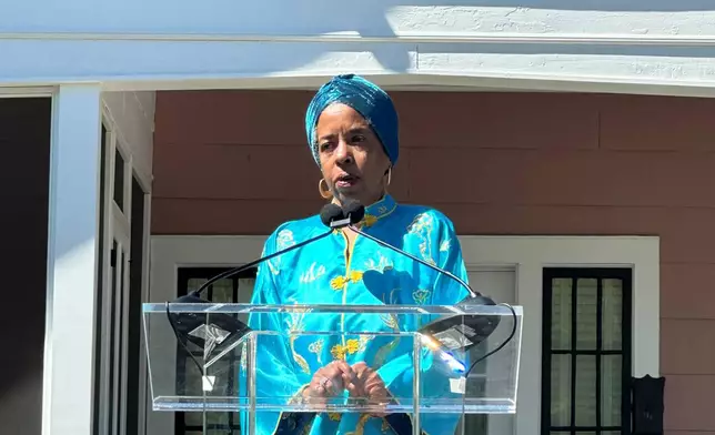 Jawana Jackson speaks at a ribbon cutting of her reconstructed family home on the grounds of The Henry Ford Museum Friday, June 12, 2026, in Dearborn, Mich. (AP Photo/Corey Williams)