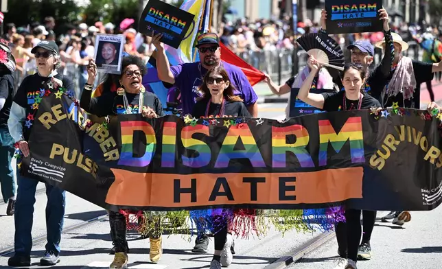 Revelers attend the annual Pride Parade in San Francisco, Monday, June 28, 2026. (AP Photo/Nic Coury)