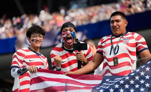 United States fans cheer prior to the World Cup Group D soccer match between the United States and Paraguay in Inglewood, Calif., near Los Angeles, Friday, June 12, 2026. (AP Photo/Andre Penner)
