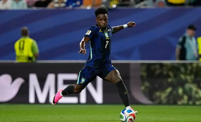 Brazil's Vinicius Junior runs with the ball during the World Cup Group C soccer match against Haiti in Philadelphia, Friday, June 19, 2026. (AP Photo/Matt Slocum)