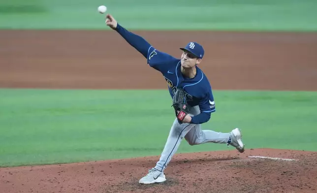 Tampa Bay Rays pitcher Griffin Jax aims a pitch during the fifth inning of a baseball game against the Miami Marlins Sunday, June 7, 2026, in Miami. (AP Photo/Marta Lavandier)